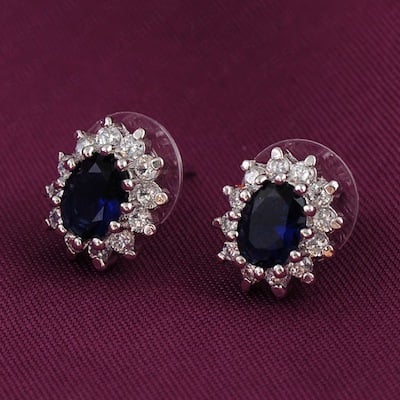 <p>Sapphire Halo Stud Earrings</p>